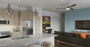 Enhance Your Kitchen at Alexan Riverside - modern kitchen and living room